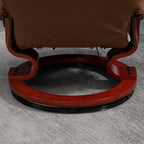 Fauteuil inclinable HomCom en similicuir avec base pivotante manuelle réglable et repose-pieds confortable et relaxant